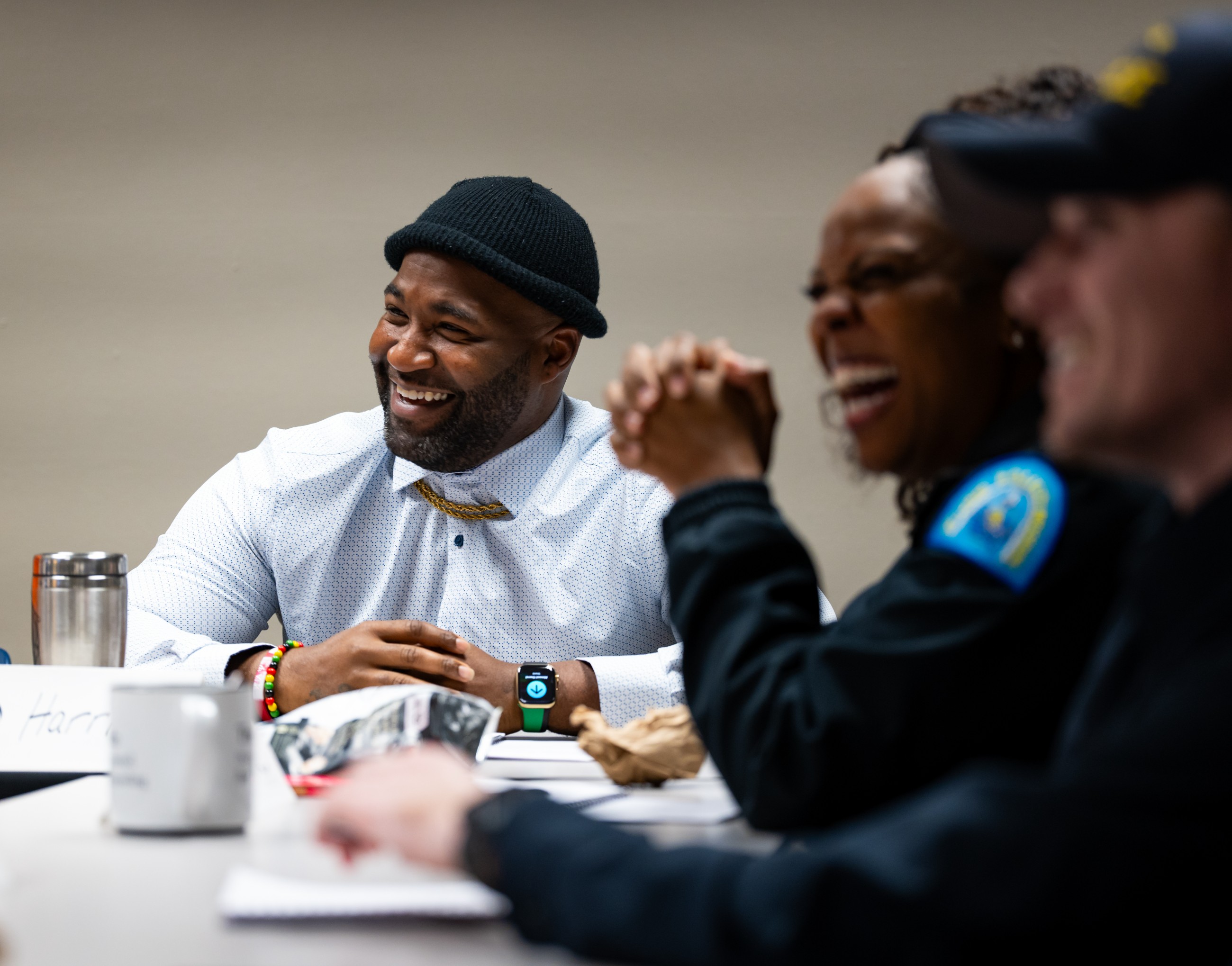 Recruiters laughing during an on-site recruitment training session